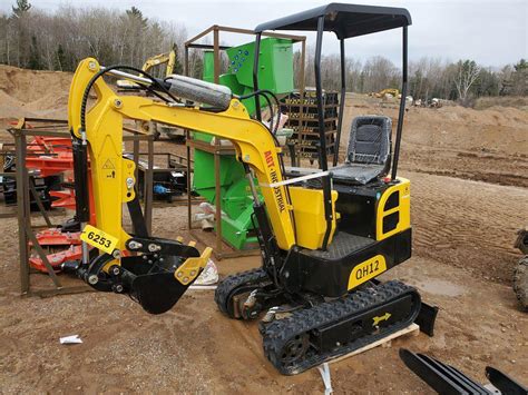 mini excavator that fits through doors and lift 700 pounds|mini excavator for sale near me.